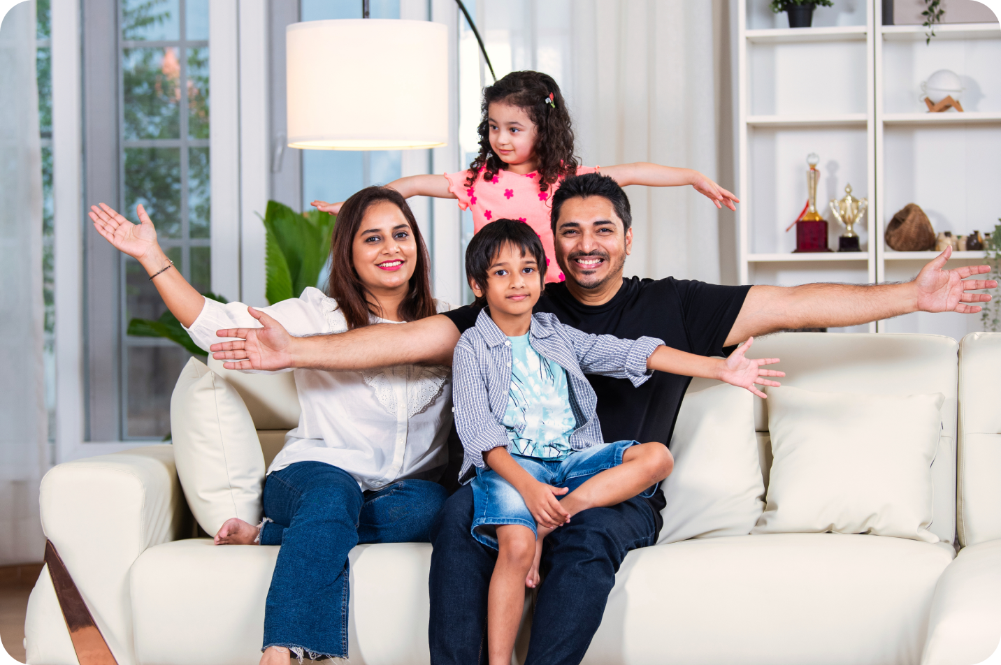 Family sitting on a sofa